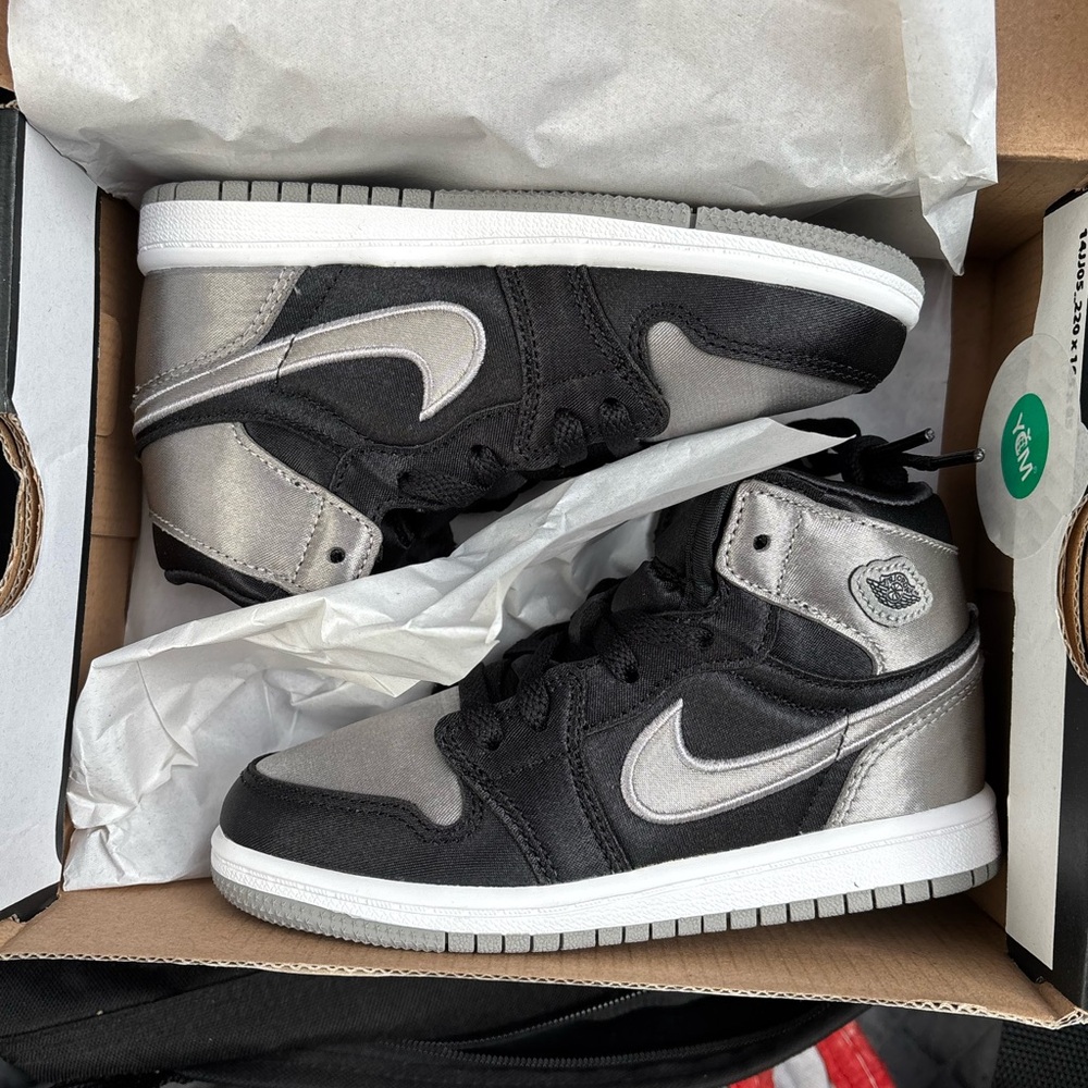 Nike Men’s Black and Metallic Silver High-Top Sneakers